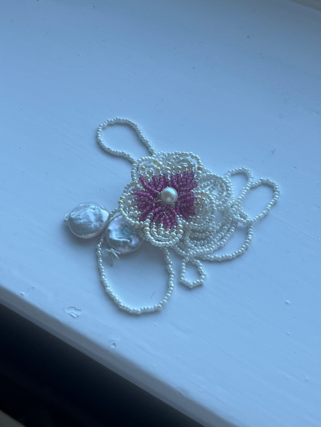Pink pansy appliqué wrap necklace